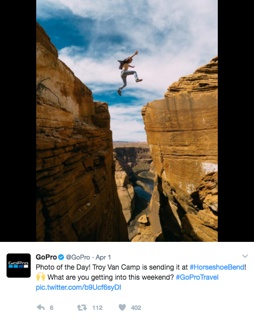 GoPro Twitter handle of man jumping from one cliff to another