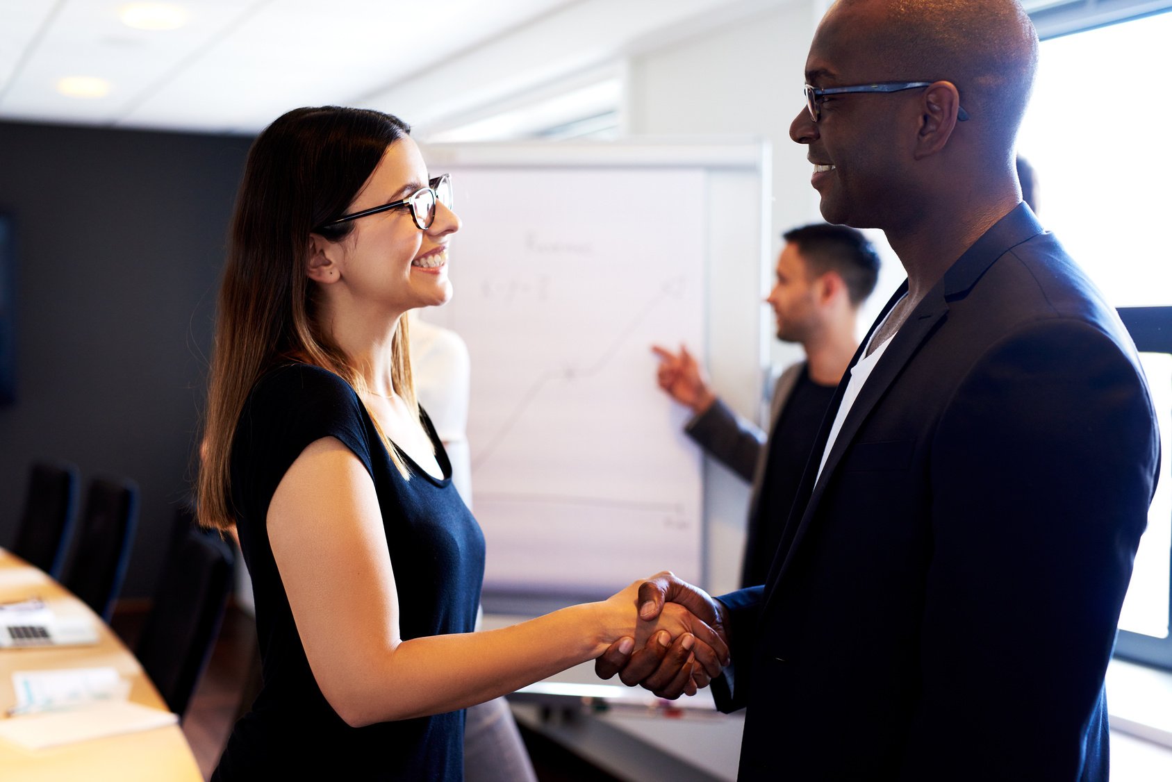 digital products - female shaking male hand