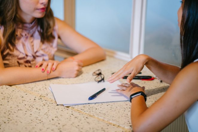 one woman coaching another woman