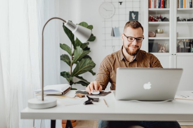 Man at laptop working on marketing
