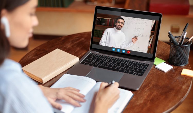 Woman engaging in online learning