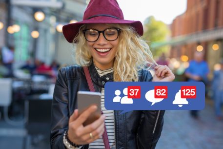 Young woman excited to be doing Facebook marketing